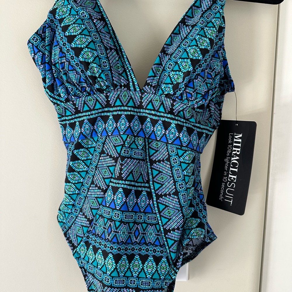 Miraclesuit Turquoise and Black Geometric Swimsuit. New with Tags.